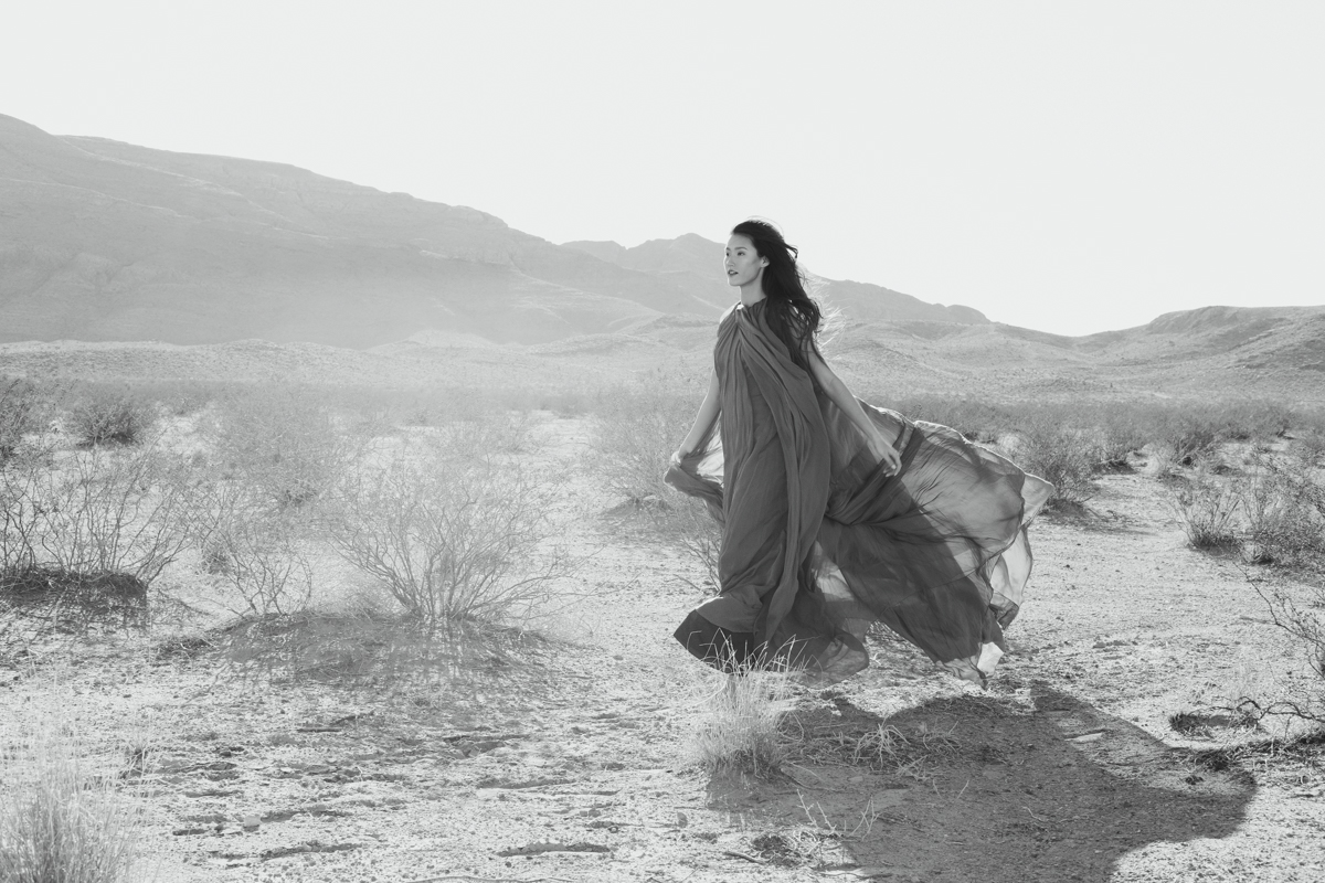 bride running through the desert