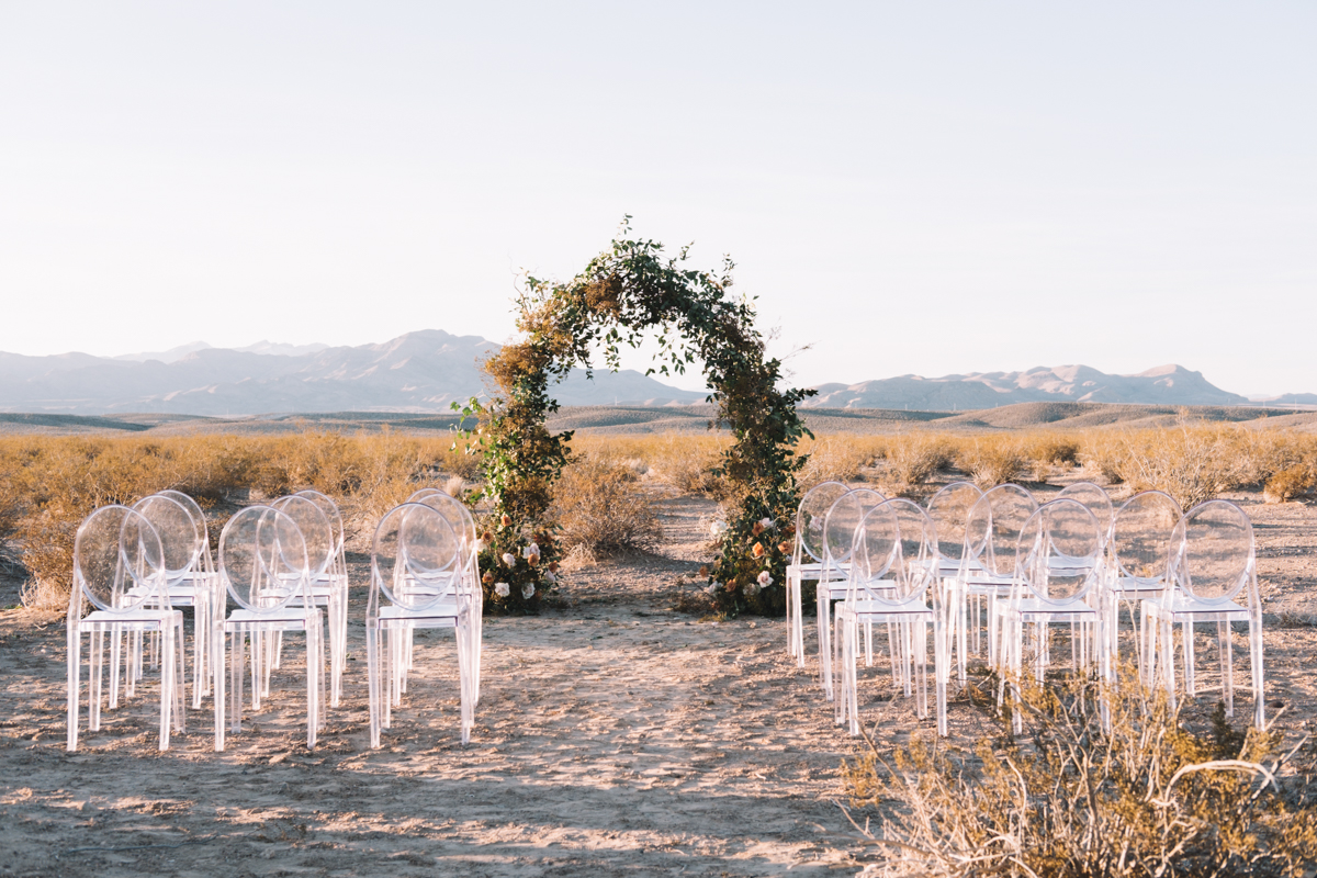 ceremony space in he desert with floral arch