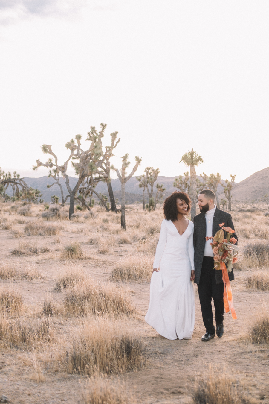 Bride and Groom smiling after getting married in Joshua Tree